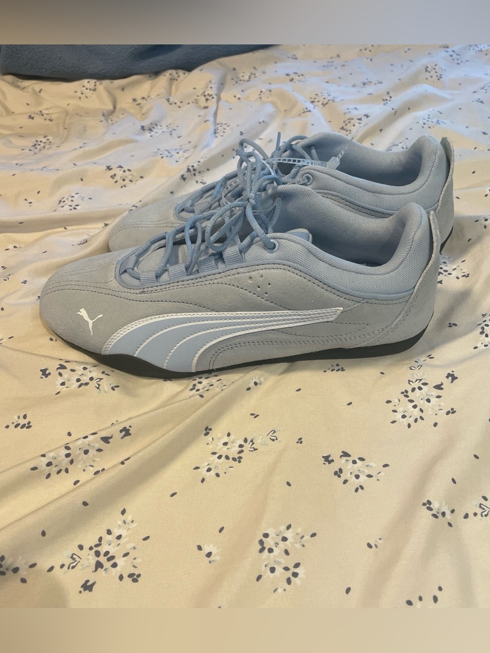 Puma light blue tennis shoes